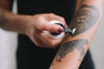 erasing tattoo, tattoo, 7 frequently asked questions about erasing your tattoo answered, Tattoos