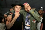 Justin Bieber, justin bieber and chris brown who is richer, justin bieber under criticism for supporting rape accused chris brown, Justin bieber