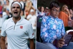 Indian origin boy reading book in Wimbledon 2019 Clash of Tennis, Wimbledon 2019 Clash of Tennis, roger federer vs rafael nadal semi final indian origin boy seen engrossed in his book during wimbledon 2019 clash of tennis, Rafael nadal Indian origin boy reading book in Wimbledon 2019 Clash of Tennis, Wimbledon 2019 Clash of Tennis, roger federer vs rafael nadal semi final indian origin boy seen engrossed in his book during wimbledon 2019 clash of tennis, Rafael nadal